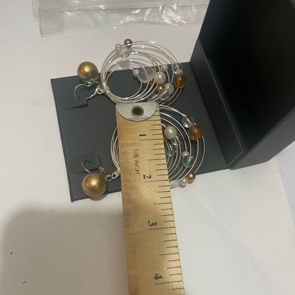 Subversive Silver Toned Hoop Earrings - Picture 8 of 8